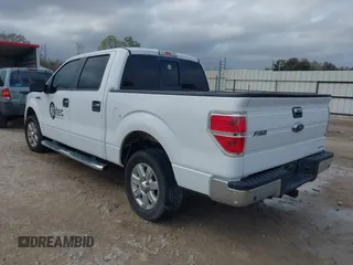 2014 Ford F-150 XL with VIN 1FTFW1CF9EKD01702, listed as a IAAI auction lot 41447899 with 185,247 mi miles. Bid and sale history available at carsss.com. Image 3.