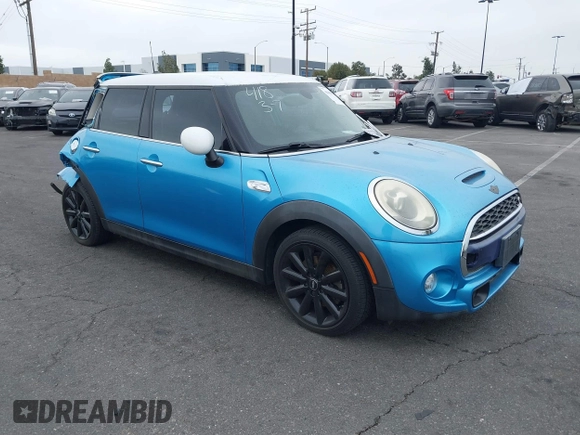 2015 MINI Hardtop 4 Door S with VIN WMWXU3C58F2B58305, listed as a IAAI auction lot 41413715 with 98,413 mi miles and . Bid and sale history available at DreamBid. Image 1.