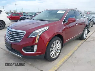2017 Cadillac XT5 Platinum AWD with VIN 1GYKNFRS9HZ126747, listed as a IAAI auction lot 41810902 with 106,507 mi miles. Bid and sale history available at carsss.com. Image 2.