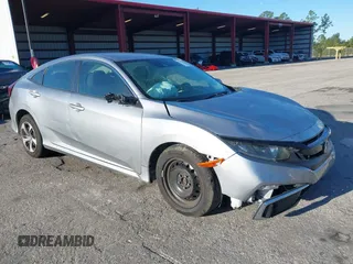 2020 Honda Civic LX with VIN 19XFC2F63LE004953, listed as a IAAI auction lot 41824922 with 71,458 mi miles and . Bid and sale history available at DreamBid. Image 1.