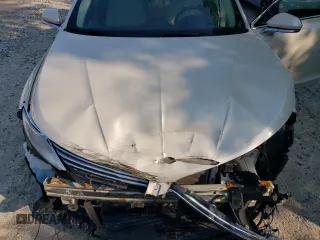 2015 Lincoln MKZ z VIN 3LN6L2JK4FR629312, wystawiony jako Copart lot #60230405 z przebiegiem 79 570 mil mil oraz Szkoda całkowita • Salvage title. Historia ofert i sprzedaży dostępna na DreamBid. Obrazek 11.