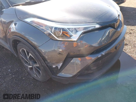 2019 Toyota C-HR XLE with VIN JTNKHMBX4K1048614, listed as a IAAI auction lot 41800696 with 78,191 mi miles. Bid and sale history available at carsss.com. Image 6.