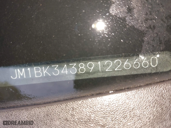 2009 Mazda Mazda3 s Touring with VIN JM1BK343891226660, listed as a IAAI auction lot 41745709 with 225,000 mi miles. Bid and sale history available at carsss.com. Image 9.