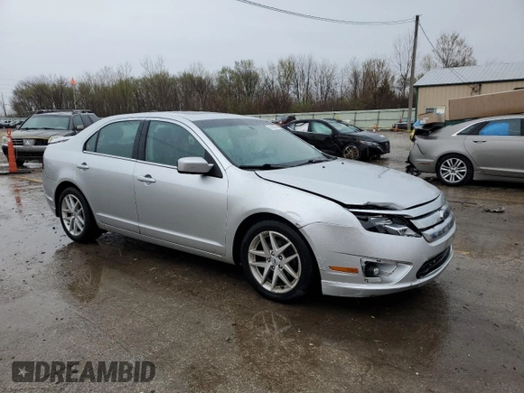 2012 Ford Fusion SEL z VIN 3FAHP0JA3CR156338, wystawiony jako Copart lot #51996885 z przebiegiem 162 892 mil mil oraz Szkoda całkowita • Salvage title. Historia ofert i sprzedaży dostępna na DreamBid. Obrazek 4.