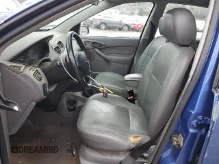 2003 Ford Focus ZTS with VIN 1FAFP38383W243231, listed as a Copart auction lot 86895774 with 124,322 mi miles and Salvage Title. Bid and sale history available at carsss.com. Image 7.
