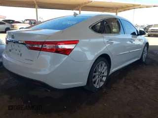 2015 Toyota Avalon Limited with VIN 4T1BK1EB2FU170909, listed as a IAAI auction lot 42035089 with 239,385 mi miles and . Bid and sale history available at DreamBid. Image 4.