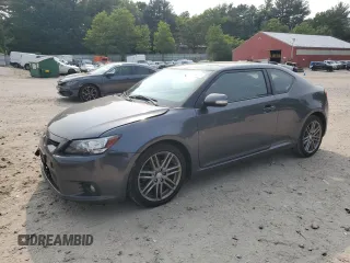 2012 Scion tC z VIN JTKJF5C75C3031796, wystawiony jako Copart lot #59686865 z przebiegiem 121 725 mil mil oraz Czysty tytuł • Clean title. Historia ofert i sprzedaży dostępna na DreamBid. Obrazek 1.