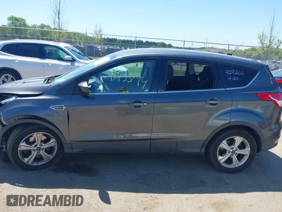 2016 Ford Escape SE z VIN 1FMCU9GX1GUB92472, wystawiony jako IAAI lot #42133744 z przebiegiem 184 000 mil mil oraz . Historia ofert i sprzedaży dostępna na DreamBid. Obrazek 13.