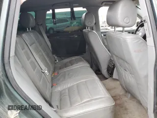 2004 Volkswagen Touareg with VIN WVGCM67L04D027410, listed as a Copart auction lot 79044964 with 100,509 mi miles and Salvage title. Bid and sale history available at DreamBid. Image 11.