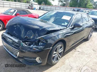 2023 Audi A6 Premium z VIN WAUD3BF2XPN048712, wystawiony jako IAAI lot #42127601 z przebiegiem 52 303 mil mil oraz . Historia ofert i sprzedaży dostępna na DreamBid. Obrazek 2.