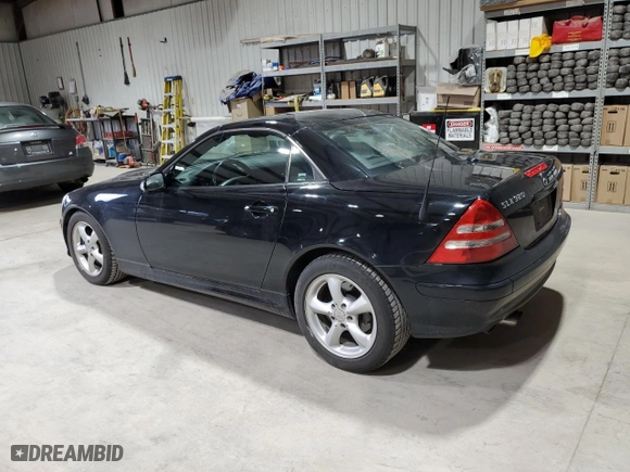 2003 Mercedes-Benz SLK-Class 3.2L with VIN WDBKK65F23F277574, listed as a Copart auction lot 82523004 with 112,143 mi miles and Clean Title. Bid and sale history available at carsss.com. Image 2.