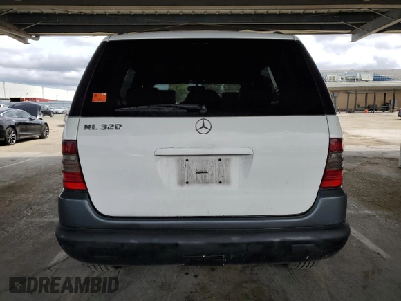 1999 Mercedes-Benz M 320/430/500 with VIN 4JGAB54E9XA130876, listed as a Copart auction lot 51714835 with 191,810 mi miles and Salvage Title. Bid and sale history available at DreamBid. Image 6.