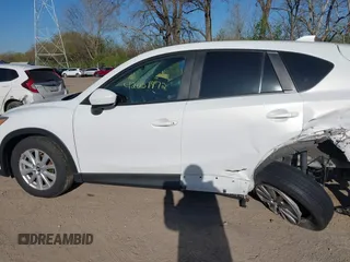 2014 Mazda CX-5 Sport with VIN JM3KE2BE8E0301175, listed as a IAAI auction lot 42051972 with 121,821 mi miles and . Bid and sale history available at carsss.com. Image 14.