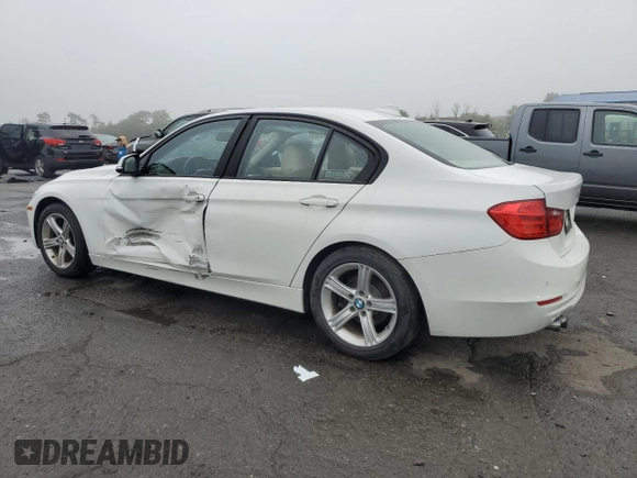 2014 BMW 3 Series 328i with VIN WBA3C1C50EK116423, listed as a Copart auction lot 61422515 with 166,006 mi miles and Salvage title. Bid and sale history available at DreamBid. Image 2.