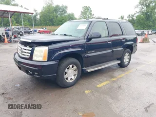 2005 Cadillac Escalade z VIN 1GYEK63N95R124940, wystawiony jako IAAI lot #42255300 z przebiegiem 160 355 mil mil oraz . Historia ofert i sprzedaży dostępna na DreamBid. Obrazek 2.