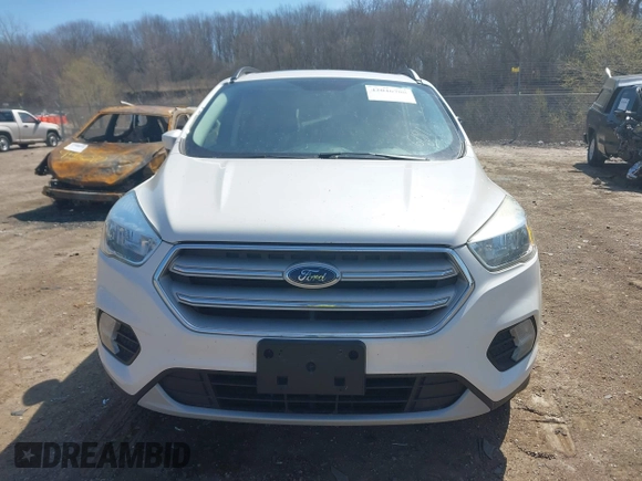 2018 Ford Escape SE z VIN 1FMCU9GD4JUB06181, wystawiony jako IAAI lot #42046708 z przebiegiem 160 987 mil mil oraz . Historia ofert i sprzedaży dostępna na DreamBid. Obrazek 13.