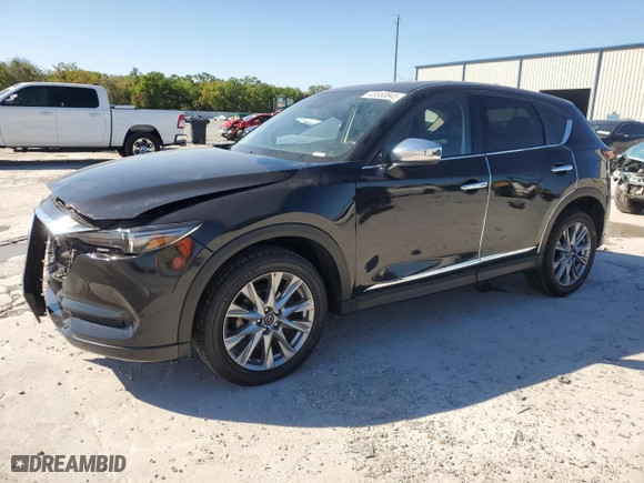 2020 Mazda CX-5 Grand Touring with VIN JM3KFADM7L0780990, listed as a Copart auction lot 48550845 with 85,942 mi miles and Salvage Title. Bid and sale history available at carsss.com. Image 1.