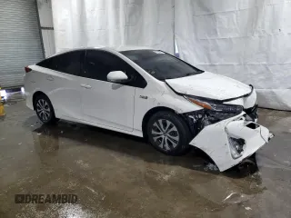 2021 Toyota Prius LE with VIN JTDKAMFP3M3176000, listed as a Copart auction lot 59836145 with 75,196 mi miles and Clean title. Bid and sale history available at DreamBid. Image 4.