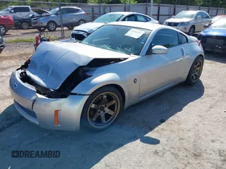 2003 Nissan 350Z Touring with VIN JN1AZ34E93T011392, listed as a IAAI auction lot 42096385 with 83,429 mi miles and . Bid and sale history available at DreamBid. Image 2.