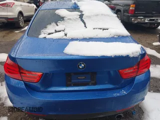 2017 BMW 4 Series 440i with VIN WBA4P1C50HK522098, listed as a IAAI auction lot 41282953 with 105,299 mi miles and . Bid and sale history available at carsss.com. Image 16.
