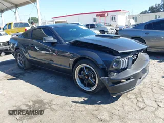 2009 Ford Mustang GT with VIN 1ZVHT82H895128608, listed as a IAAI auction lot 41611889 with 98,474 mi miles and . Bid and sale history available at DreamBid. Image 1.