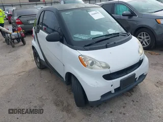 2010 Smart fortwo Pure z VIN WMEEJ3BA5AK390904, wystawiony jako IAAI lot #41688922 z przebiegiem Nie podano mil oraz . Historia ofert i sprzedaży dostępna na DreamBid. Obrazek 1.