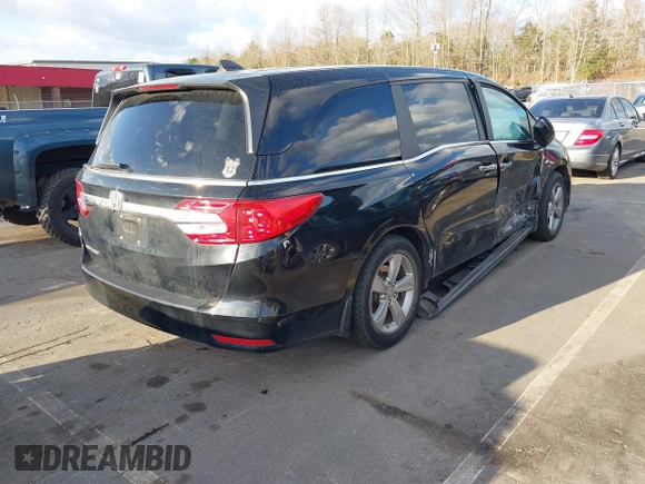 2019 Honda Odyssey EX-L with VIN 5FNRL6H74KB061567, listed as a IAAI auction lot 41810919 with 129,146 mi miles. Bid and sale history available at carsss.com. Image 4.