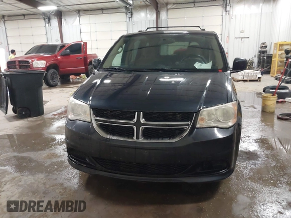 2014 Dodge Grand Caravan SXT with VIN 2C4RDGCGXER154709, listed as a IAAI auction lot 41117603 with 214,872 mi miles and . Bid and sale history available at DreamBid. Image 12.