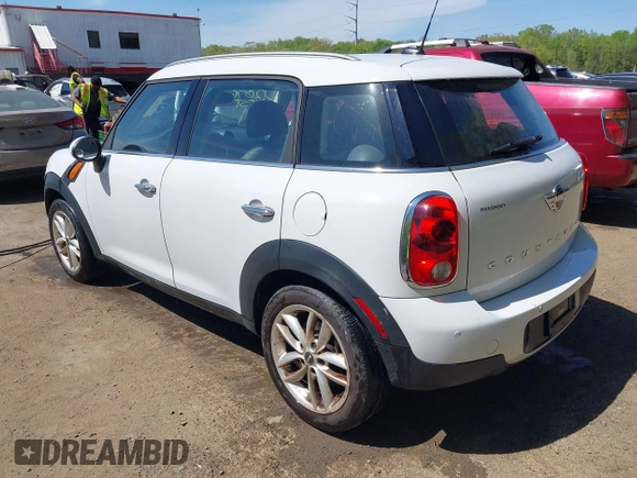 2013 MINI Countryman with VIN WMWZB3C56DWR36117, listed as a IAAI auction lot 42076676 with 168,750 mi miles and . Bid and sale history available at DreamBid. Image 3.