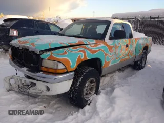 1999 Dodge Dakota SLT with VIN 1B7GG22Y6XS137628, listed as a Copart auction lot 83237454 with 196,200 mi miles and Salvage Title. Bid and sale history available at carsss.com. Image 1.