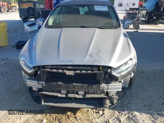 2014 Ford Fusion SE Hybrid with VIN 3FA6P0LU2ER319451, listed as a IAAI auction lot 41998180 with 170,191 mi miles. Bid and sale history available at carsss.com. Image 6.