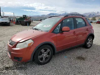 2009 Suzuki SX4 Man AWD with VIN JS2YB413196203590, listed as a Copart auction lot 77984254 with 0 mi miles and Salvage Title. Bid and sale history available at carsss.com. Image 1.