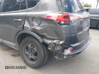 2017 Toyota RAV4 LE with VIN 2T3ZFREV6HW395050, listed as a IAAI auction lot 42136752 with 202,270 mi miles and . Bid and sale history available at carsss.com. Image 6.