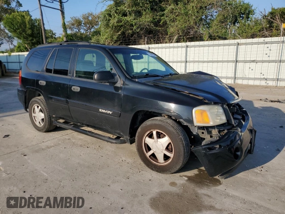 2003 GMC Envoy SLE with VIN 1GKDS13S232329083, listed as a Copart auction lot 73147534 with 212,645 mi miles and Salvage Title. Bid and sale history available at DreamBid. Image 4.