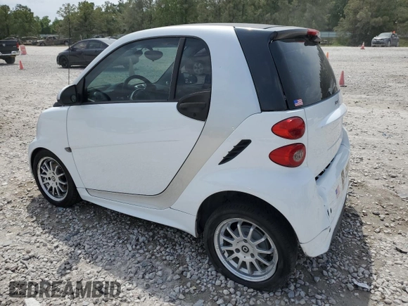 2015 Smart fortwo Passion с VIN WMEEJ3BA6FK807938, выставлен на аукционе Copart как лот 53860475 с пробегом 77 748 миль миль и Списание • Salvage title. История ставок и продаж доступна на DreamBid. Изображение 2.