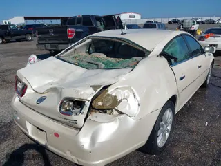 2008 Buick Lucerne CXS with VIN 1G4HE57Y58U143832, listed as a IAAI auction lot 40344580 with 107,399 mi miles. Bid and sale history available at carsss.com. Image 6.