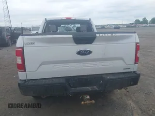 2018 Ford F-150 XL with VIN 1FTEX1EP1JKF66557, listed as a IAAI auction lot 42099567 with 126,516 mi miles and . Bid and sale history available at DreamBid. Image 16.