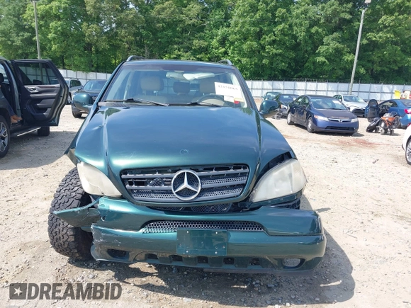 2000 Mercedes-Benz M 320/430/500 z VIN 4JGAB54E9YA180890, wystawiony jako IAAI lot #42151065 z przebiegiem 98 866 mil mil oraz . Historia ofert i sprzedaży dostępna na DreamBid. Obrazek 12.