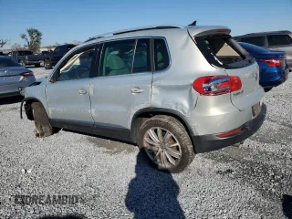 2014 Volkswagen Tiguan SE z VIN WVGAV3AXXEW502310, wystawiony jako Copart lot #42095985 z przebiegiem 130 033 mil mil oraz Szkoda całkowita • Salvage title. Historia ofert i sprzedaży dostępna na DreamBid. Obrazek 2.