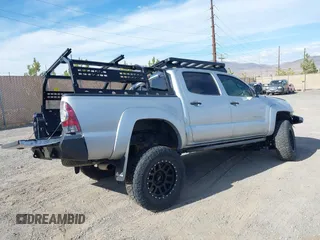 2013 Toyota Tacoma with VIN 5TFLU4EN2DX049615, listed as a IAAI auction lot 41893876 with 160,752 mi miles and . Bid and sale history available at DreamBid. Image 4.