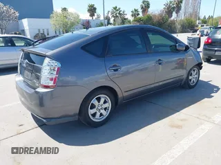 2007 Toyota Prius z VIN JTDKB20U273215633, wystawiony jako IAAI lot #41955538 z przebiegiem 172 957 mil mil oraz . Historia ofert i sprzedaży dostępna na DreamBid. Obrazek 4.