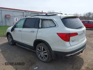 2016 Honda Pilot Touring with VIN 5FNYF6H90GB102403, listed as a IAAI auction lot 42007825 with 69,450 mi miles. Bid and sale history available at carsss.com. Image 3.