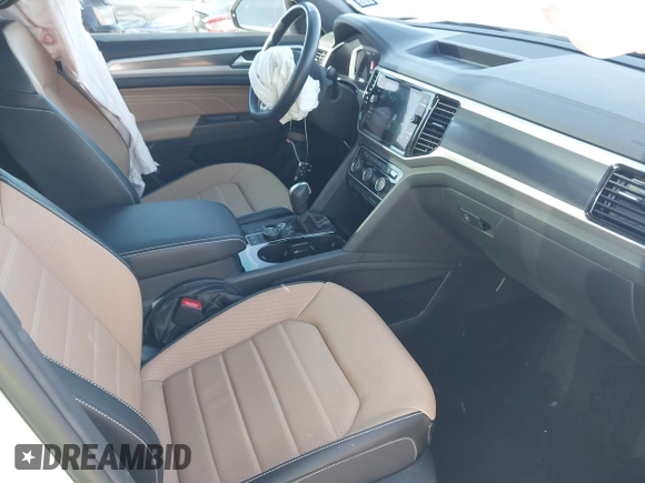 2022 Volkswagen Atlas SEL Premium R-Line with VIN 1V2FE2CA6NC220596, listed as a IAAI auction lot 41864407 with 13,120 mi miles and . Bid and sale history available at DreamBid. Image 5.