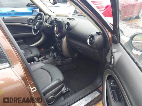 2016 MINI Countryman with VIN WMWZB3C50GWR47537, listed as a IAAI auction lot 42242795 with 46,960 mi miles and . Bid and sale history available at DreamBid. Image 5.