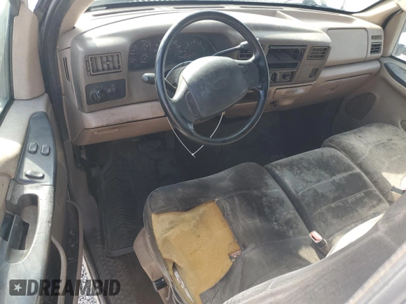 1999 Ford F-250 XL с VIN 1FTNF20L3XEA99923, выставлен на аукционе Copart как лот 58765435 с пробегом 559 043 миль миль и Списание • Salvage title. История ставок и продаж доступна на DreamBid. Изображение 8.