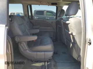 2007 Honda Odyssey EX-L z VIN 5FNRL38647B028078, wystawiony jako Copart lot #56208005 z przebiegiem 192 000 mil mil oraz Szkoda całkowita • Salvage title. Historia ofert i sprzedaży dostępna na DreamBid. Obrazek 10.