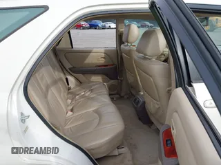 1999 Lexus RX 300 Luxury SUV with VIN JT6GF10U5X0038086, listed as a IAAI auction lot 41571366 with 214,094 mi miles. Bid and sale history available at carsss.com. Image 8.