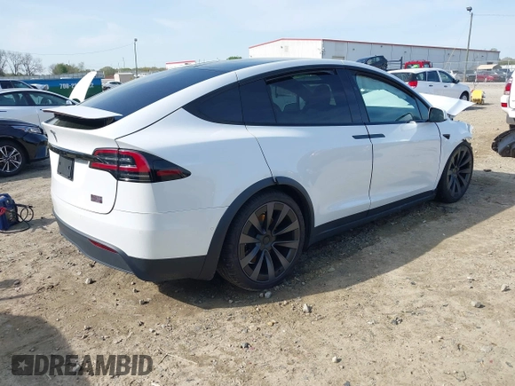 2022 Tesla Model X Plaid z VIN 7SAXCBE6XNF340704, wystawiony jako IAAI lot #41928524 z przebiegiem Nie podano mil oraz . Historia ofert i sprzedaży dostępna na DreamBid. Obrazek 4.