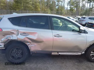 2018 Toyota RAV4 LE with VIN JTMBFREV8JJ224872, listed as a IAAI auction lot 41907962 with 104,605 mi miles and . Bid and sale history available at DreamBid. Image 13.