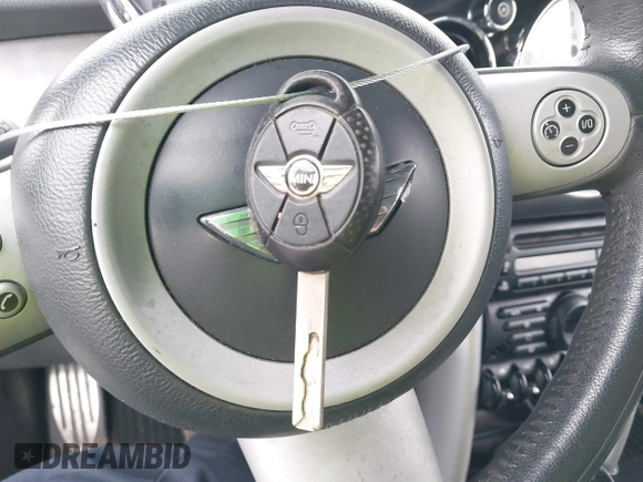2007 MINI Convertible S with VIN WMWRH33527TJ43515, listed as a IAAI auction lot 41651846 with Not provided miles and . Bid and sale history available at DreamBid. Image 11.